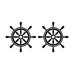 Obraz premium Two black ship wheels are prominently displayed against a white background