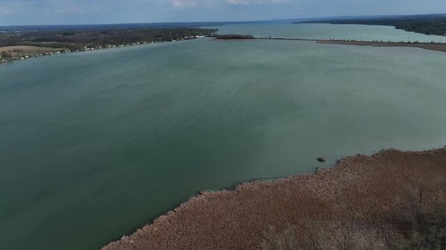 Cayuga Lake glacier finger lake in central New York State with natural wetlands aerial drone view
