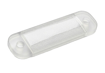 Close-up of a sterile medical bandage with transparent adhesive backing on a white background.