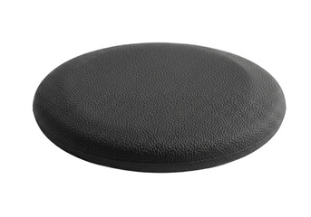 Close up of a textured black round cushion on a white background