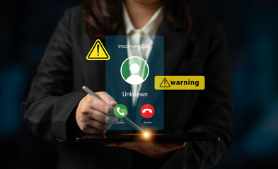 A professional individual dressed in a business suit holds a tablet displaying an incoming call notification with warning signs, illustrating modern communication challenges. Gantry © InfiniteFlow