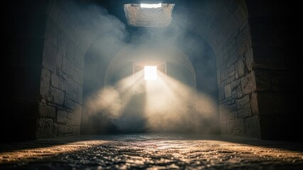 Light streams through opening in stone tunnel, illuminating dust