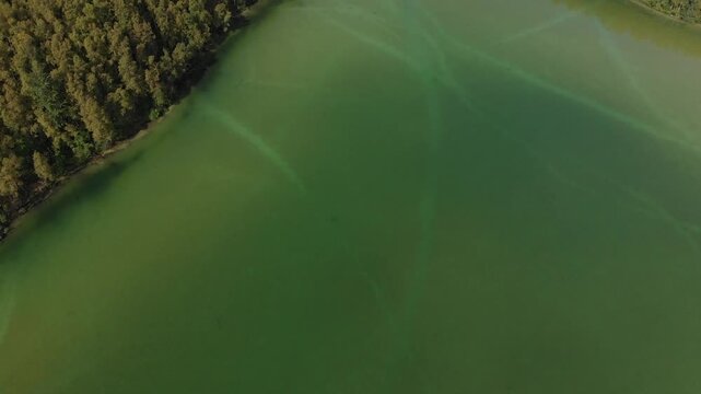  Tilt up aerial view of Edmonds Lake and surrounding wilderness in Alaska