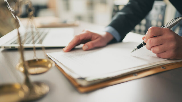 The lawyer working on the documents