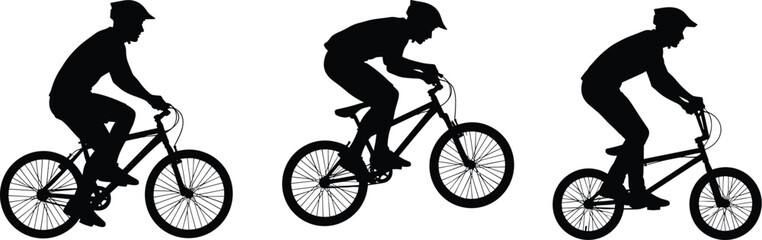 Obraz premium Silhouettes of cyclist performing stunts, jumping mid-air, standing pedaling, wearing helmets, showcasing dynamic biking postures and motion