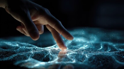 Fototapeta premium Human hand touching illuminated surface creating digital futuristic effect