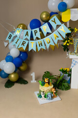 First Birthday Safari Theme Celebration Setup with Cake and Balloons