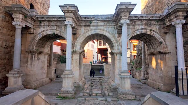 Hadrian Gate, also known as the Uc Kapilar, at the entrance to Antalya Old Town or Kaleici on a sunny day