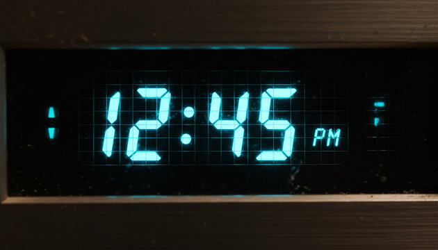 Vintage vacuum fluorescent display VFD macro with glowing cyan numbers