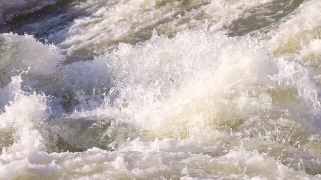 Running water in Hambleden Weir, River Thames in Henley-on-Thames, South England
