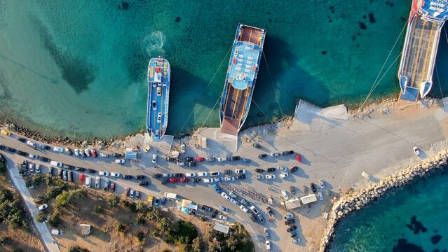 Aerial view of Elafonisos port with ferry boats and turquoise waters, Peloponnese, Greece