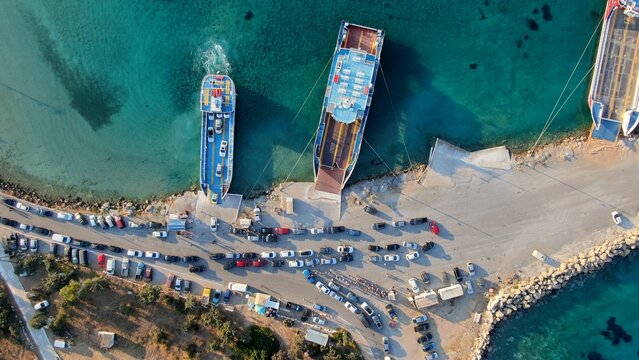 Aerial view of Elafonisos port with ferry boats and turquoise waters, Peloponnese, Greece