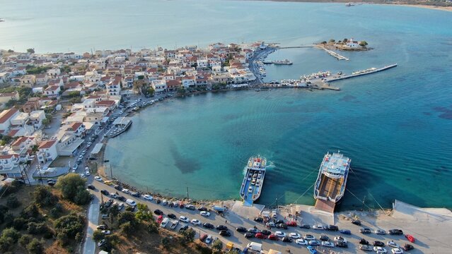 Aerial view of Elafonisos port with ferry boats and turquoise waters, Peloponnese, Greece