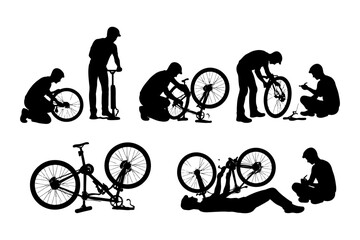 Obraz premium Silhouettes of a male cyclist repairing and maintaining a bicycle.