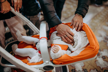 Chrzest święty, dziecko leży w wózku © rozentuzjazmowany