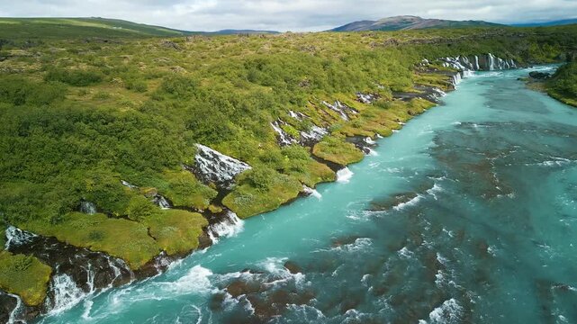 Aerial drone view of Barnafoss and Hraunfossars waterfall in west Iceland