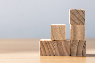 Wooden blocks stacked as growth steps concept