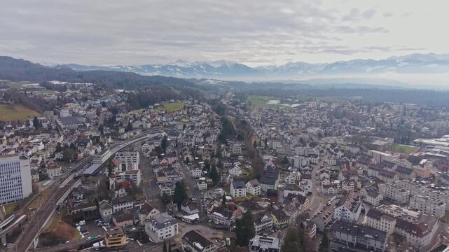 High angle shot of a clock tower in Switzerland, time-honored architecture from above.