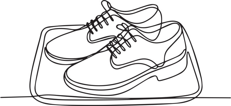 Continuous line drawing of sports shoes on a box from a side view