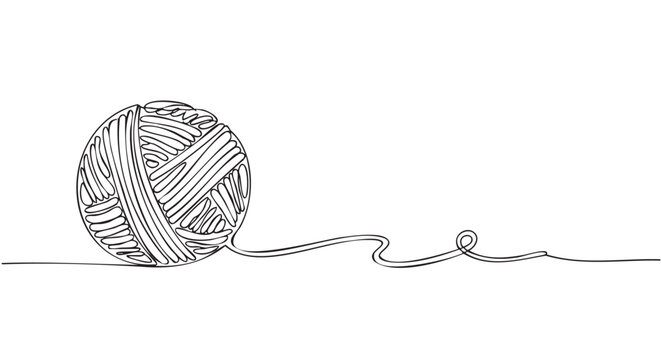 Handmade yarn ball with loose thread end and wooden crochet hook