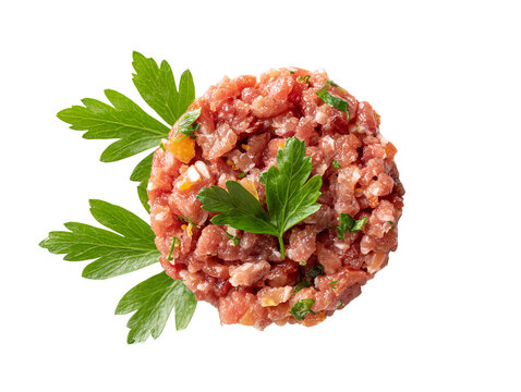 A delicious and fresh Beef Tartare, garnished with sprigs of fresh parsley Isolated Transparent Background, PNG