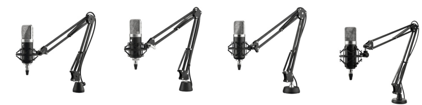 Set of professional studio condenser microphones on adjustable boom arms isolated on transparent background