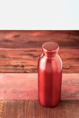 Red water bottle studio shot