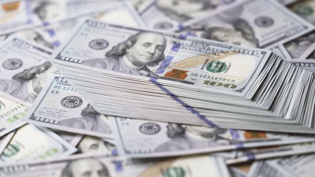 Stack of hundred dollar bills representing wealth, financial success, business profit, investment growth, cash income and economic stability concept for finance, banking and money themes.