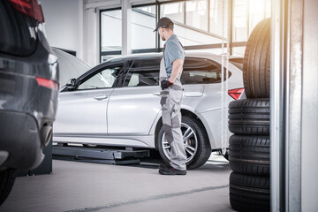 Car Service Takes Place in an Auto Repair Shop