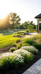 Fototapeta premium Beautifully Landscaped Garden with Lush Green Lawn, Flower Beds, and a Modern House at Sunset