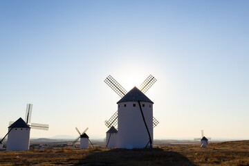 Obraz premium Ancient windmills standing on a hill in Campo de Criptana