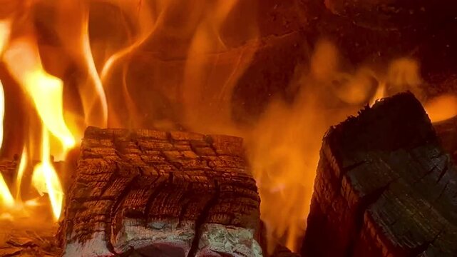 Close-up of burning firewood. Close-up of burning logs in fireplace.