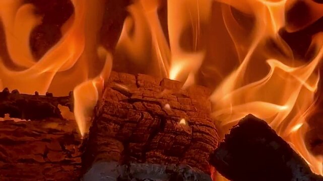 Close-up of burning firewood. Close-up of burning logs in fireplace.
