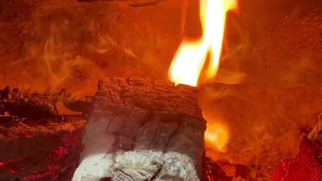 Close-up of burning firewood. Close-up of burning logs in fireplace.