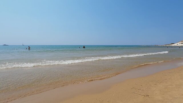 Peaceful mediterranean beach scene with clear water at Scala dei Turchi, Sicily