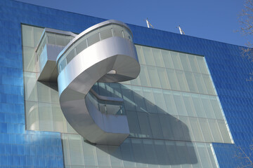 Naklejka premium Frank Gehry-designed spiral staircase, located on the south side of the Art Gallery of Ontario, viewed from Grange Park, Toronto