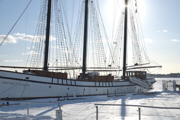 Naklejka premium The Empire Sandy, a large passenger sailing ship, moored in Toronto Harbor in winter
