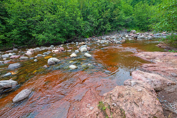 Rounded and Red Rocks of the Caribou River