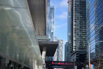 Naklejka premium looking east on Bremner Blvd to an abstract view of architecture and Scotiabank Arena, Toronto