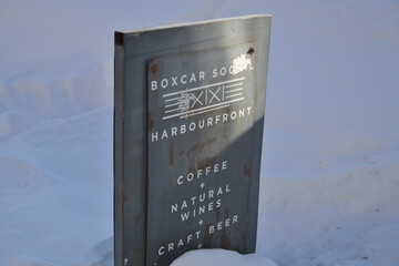 Naklejka premium old metal sign outside Boxcar Social Harbourfront, a restaurant, located at 235 Queens Quay W, Harbourfront Centre, Toronto
