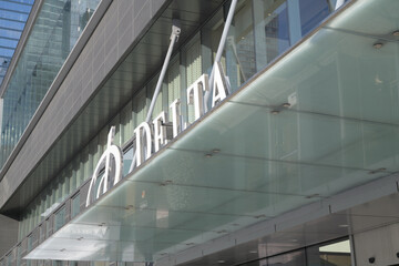 Naklejka premium sign over front entrance to Delta Hotel located at 75 Lower Simcoe St, Toronto - 