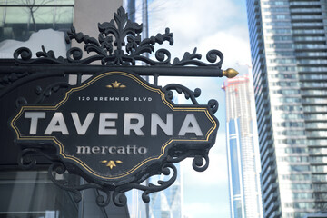Naklejka premium projecting sign outside Taverna Mercatto, an Italian restaurant, located at 120 Bremner Blvd in Southcore Financial Centre, Toronto