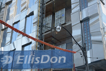 Obraz premium detail of FORMA (East Tower) with developer EllisDon banner at 266 King St W at Duncan St, Toronto