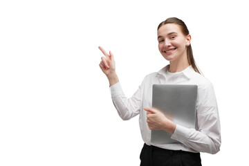 Woman smiles and points while holding a laptop during a work meeting in a bright room