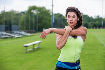 Female Athlete Works Out Outdoors, Embracing Strength, Focus, and Natural Energy