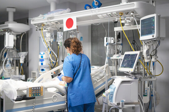 Healthcare professional working in intensive care unit