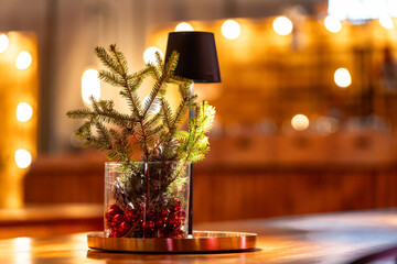 Christmas table decoration with festive holiday ornaments