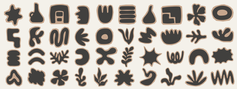 Abstract collection of organic and geometric cutout shapes .