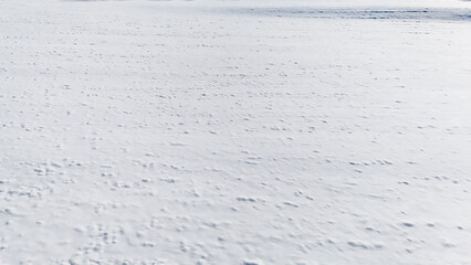 white fresh snow covered land ground from drone aerial photography background nobody