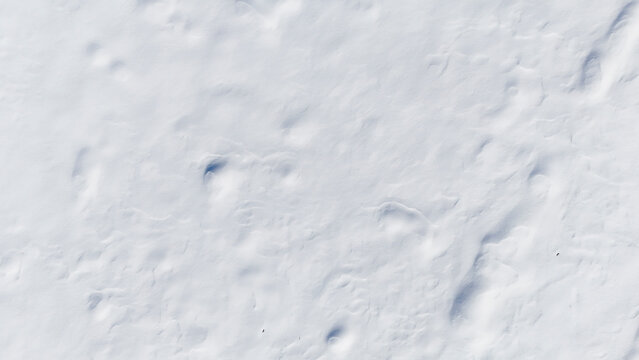 white fresh snow covered land ground from drone aerial photography background nobody